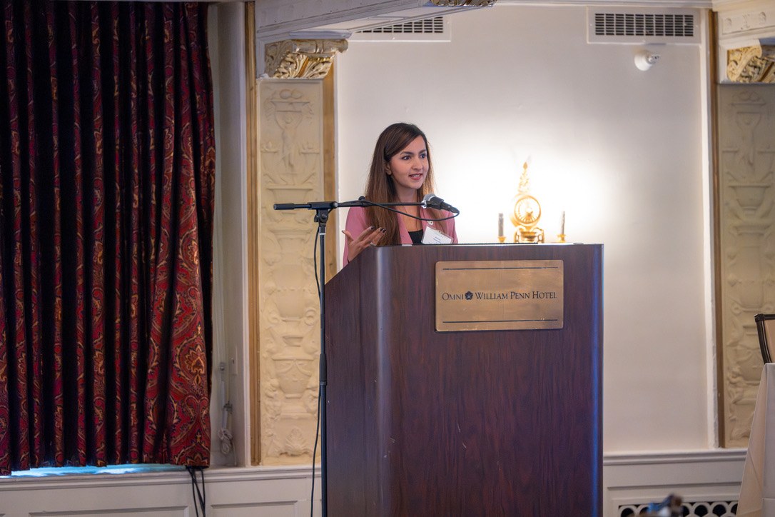 Dr. Mewawalla presenting at a podium, Omni William Penn Hotel, Pittsburgh